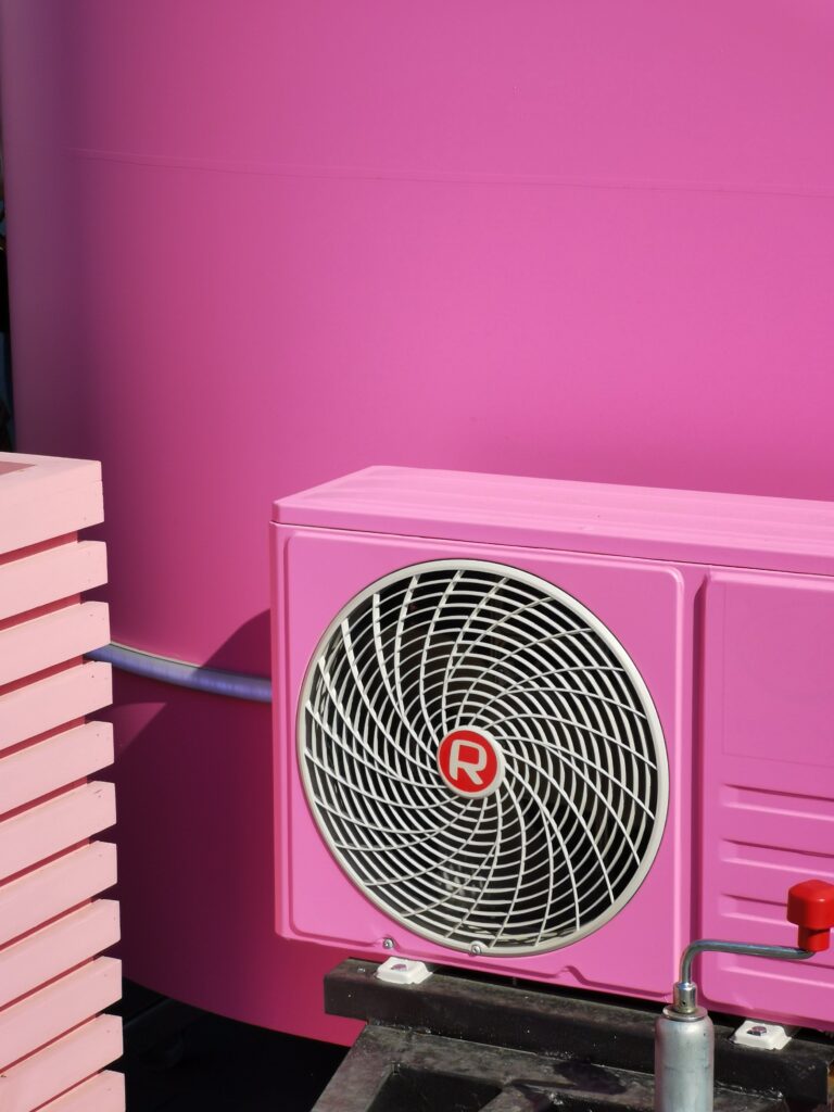 A Pink Wall and Pink Air Conditioner